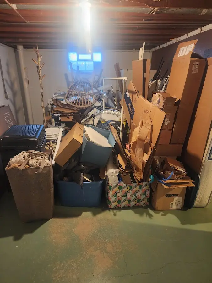 Roll-off dumpster container at job site for 2 Yard Dumpster Rental in Sodus